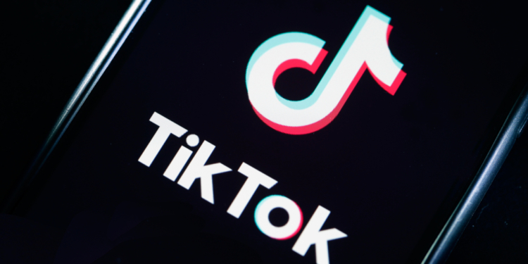 PARIS, FRANCE - MARCH 05: In this photo illustration, the social media application logo, Tik Tok is displayed on the screen of an iPhone on March 05, 2019 in Paris, France. The social network broke the rules for the protection of children's online privacy (COPPA) and was fined $ 5.7 million. The fact TikTok criticized is quite serious in the United States, the platform, which currently has more than 500 million users worldwide, collected data that should not have asked minors. TikTok, also known as Douyin in China, is a media app for creating and sharing short videos. Owned by ByteDance, Tik Tok is a leading  video platform in Asia, United States, and other parts of the world. In 2018, the application gained popularity and became the most downloaded app in the U.S. in October 2018. (Photo by Chesnot/Getty Images)
