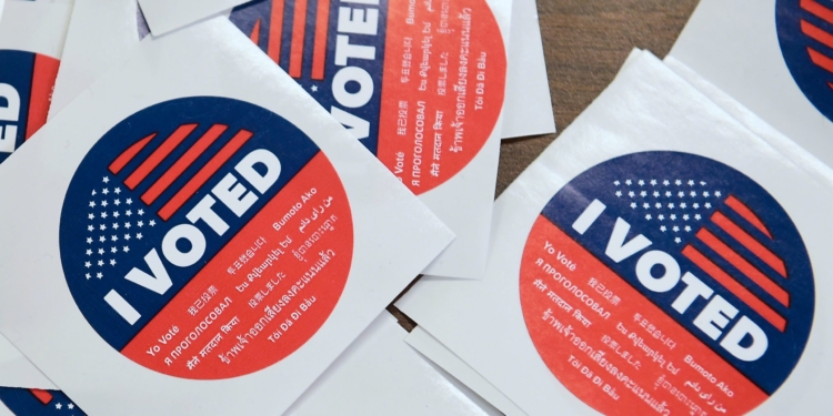 California's multi-language "I Voted" stickers on offer for early voters at the Los Angeles County Registrar's Office in Norwalk, California on November 5, 2018, a day ahead the November 6 midterm elections in the United States. (Photo by Frederic J. BROWN / AFP)        (Photo credit should read FREDERIC J. BROWN/AFP via Getty Images)